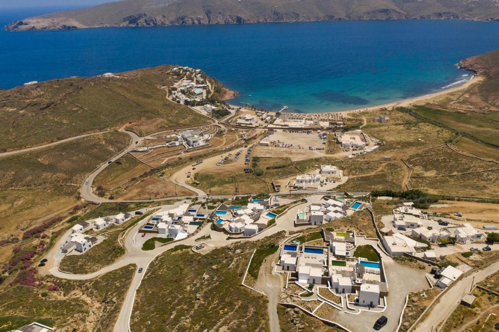 an aerial view of a village next to the ocean at Mykonos Panormos Villas in Mykonos