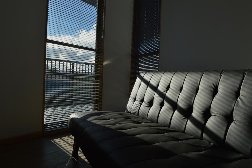 Posezení v ubytování Apart Hotel Quillango