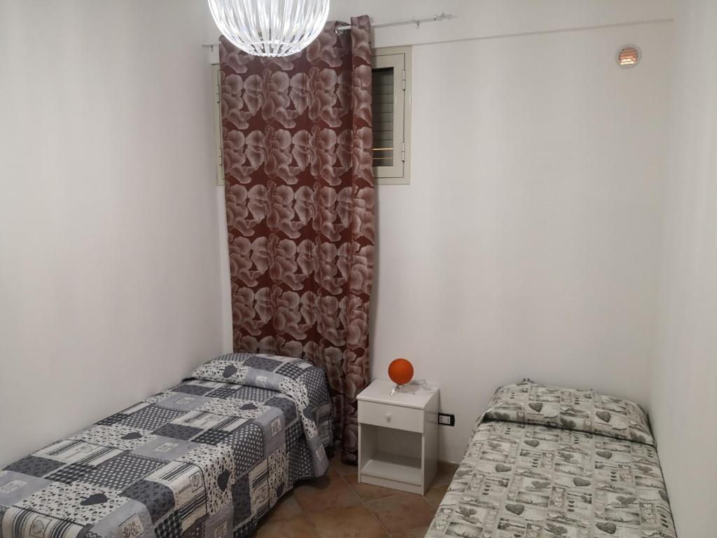 Łóżko lub łóżka w pokoju w obiekcie Holiday Beach Lumia