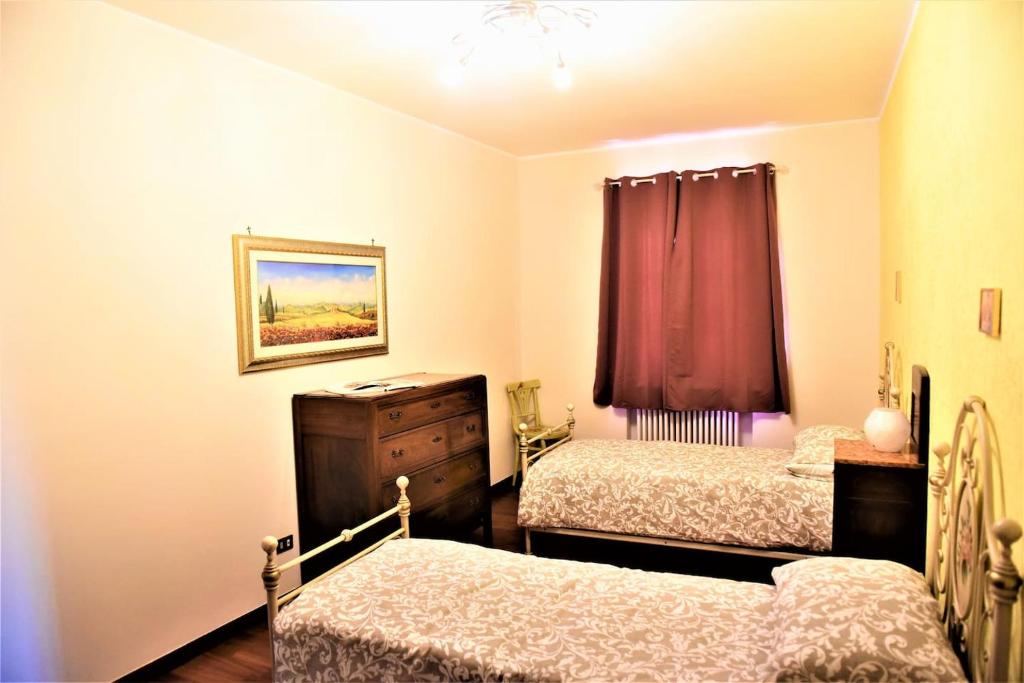 Postel nebo postele na pokoji v ubytování Il Paradiso dei nidi