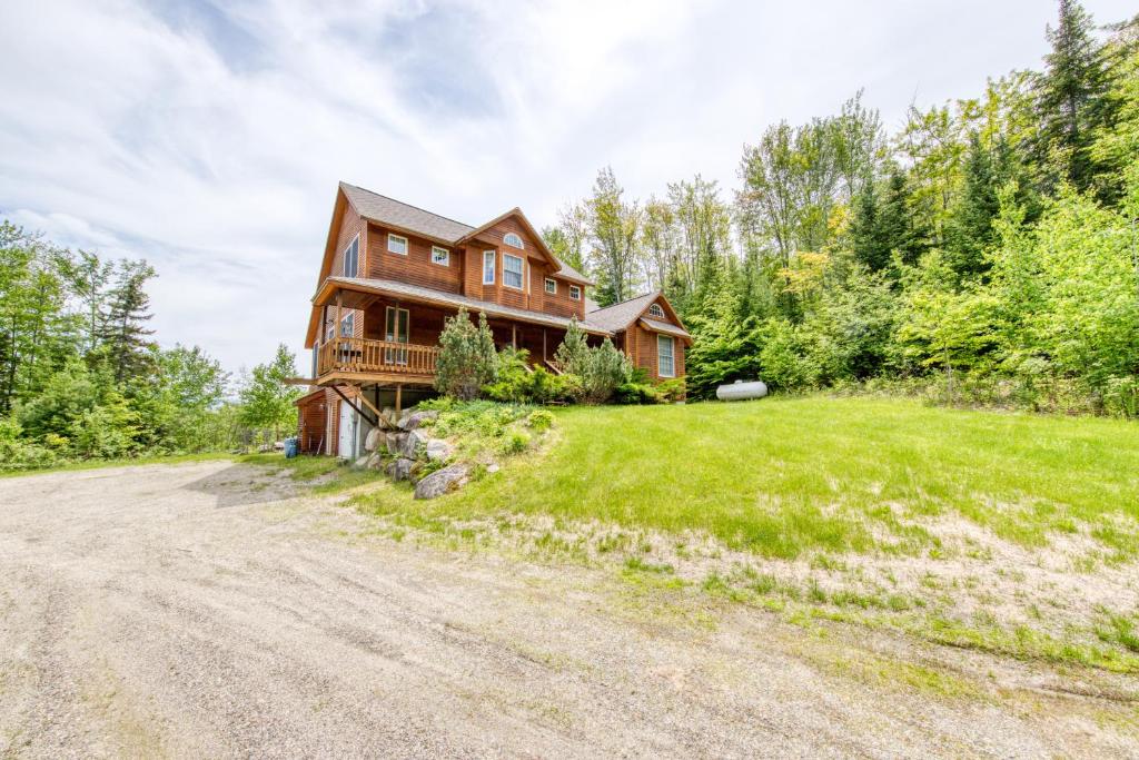 a house on a hill with a dirt road at Garfield's Grand View in Bethlehem