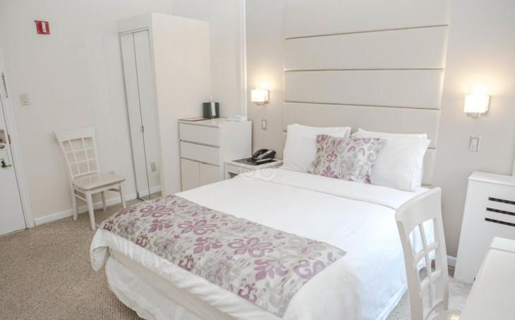 Postel nebo postele na pokoji v ubytování Da Vinci Hotel