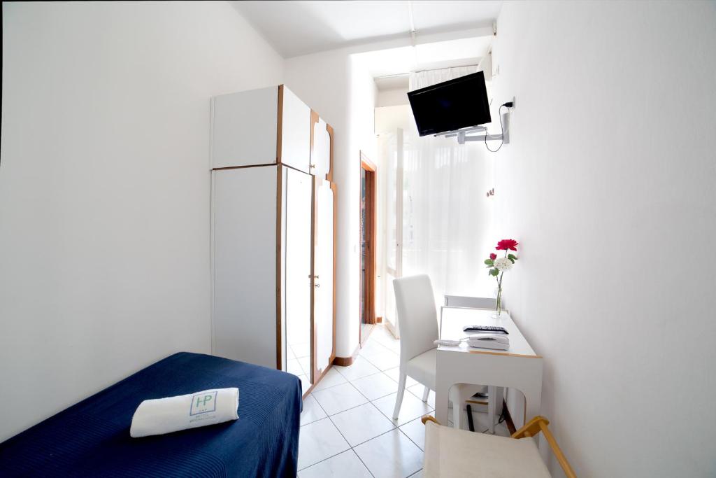 Postel nebo postele na pokoji v ubytování Hotel Promenade