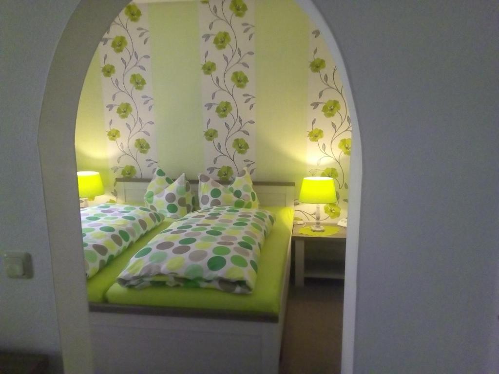 Postel nebo postele na pokoji v ubytování Pension Waldidyll