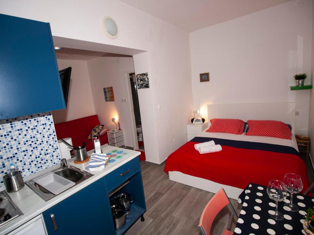 Postel nebo postele na pokoji v ubytování Apartments Barka