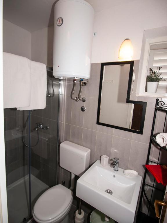Koupelna v ubytování Apartments Barka
