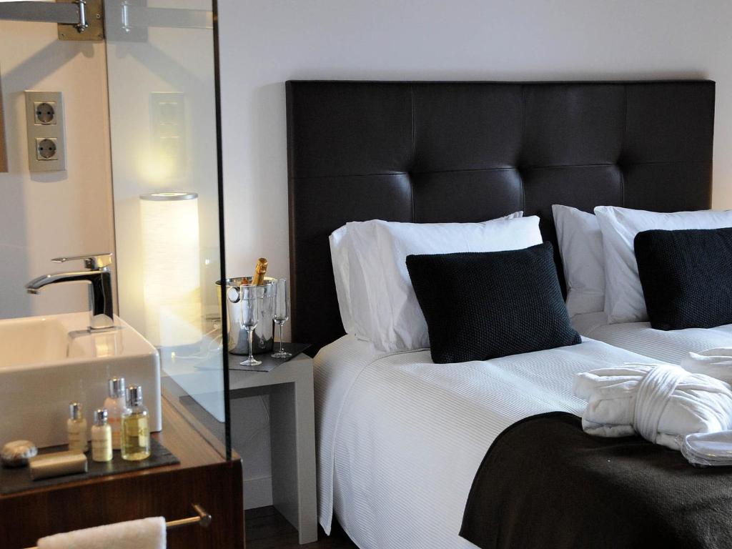 Postel nebo postele na pokoji v ubytování Bonansa Country Hotel