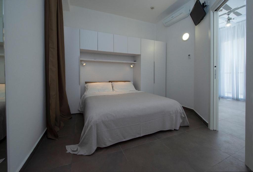 Postel nebo postele na pokoji v ubytování Hotel Niagara