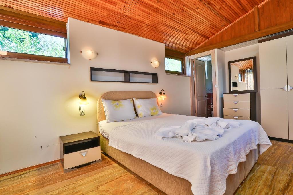 Postel nebo postele na pokoji v ubytování Villa Dundar - Kas Apartments