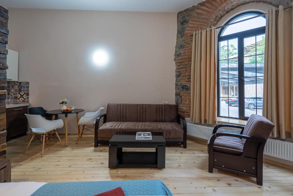 Posezení v ubytování Wine Inn Borjomi Aparthotel