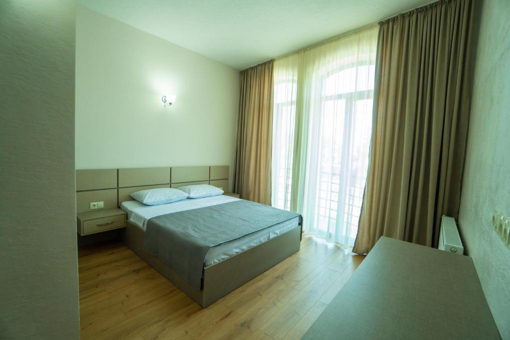 Postel nebo postele na pokoji v ubytování Twins