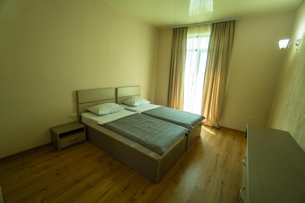 Postel nebo postele na pokoji v ubytování Twins