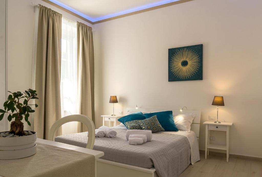 Postel nebo postele na pokoji v ubytování Guest Home RoSe