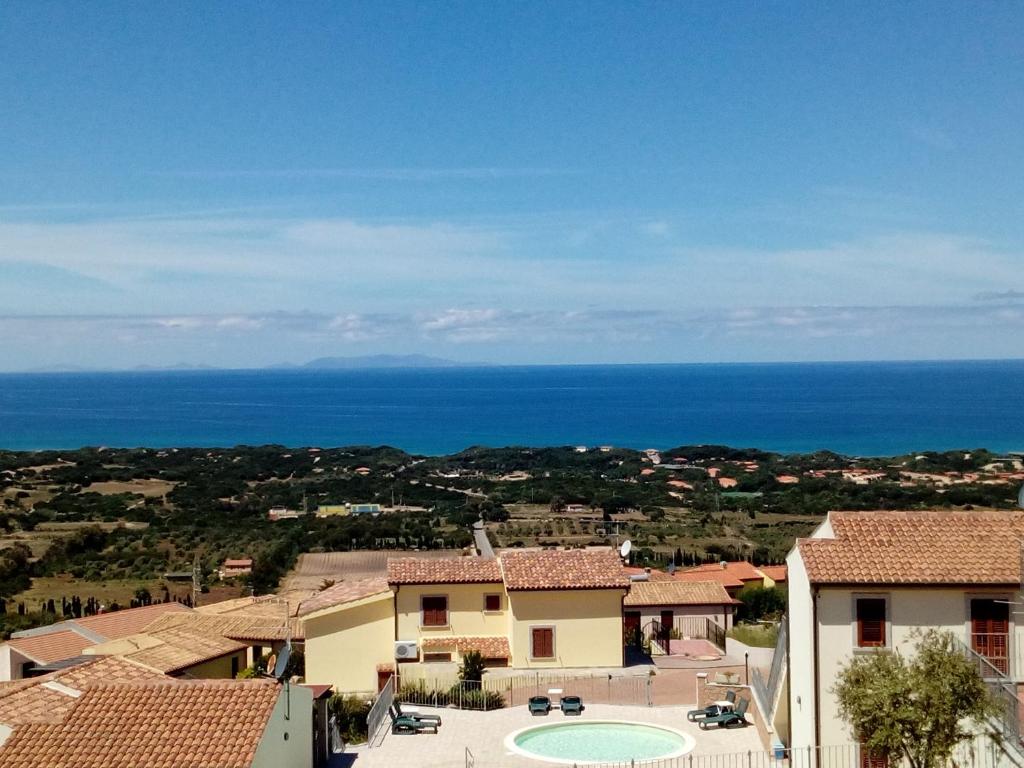 a view of the ocean from a house at SEA VIEW HOUSE SARDEGNA in Badesi