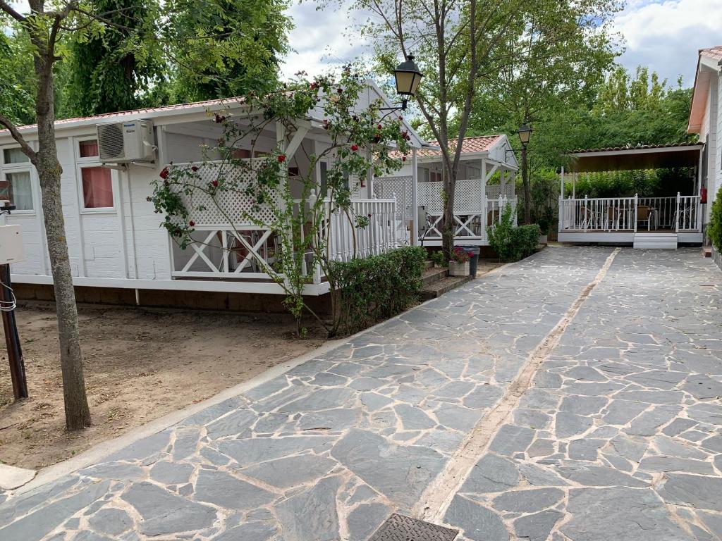 Jardín al aire libre en Bungalows & Albergue La Playa