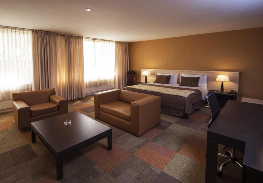 Postel nebo postele na pokoji v ubytování Hotel Alborada