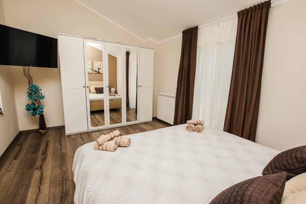 Posteľ alebo postele v izbe v ubytovaní Villa Elizabet