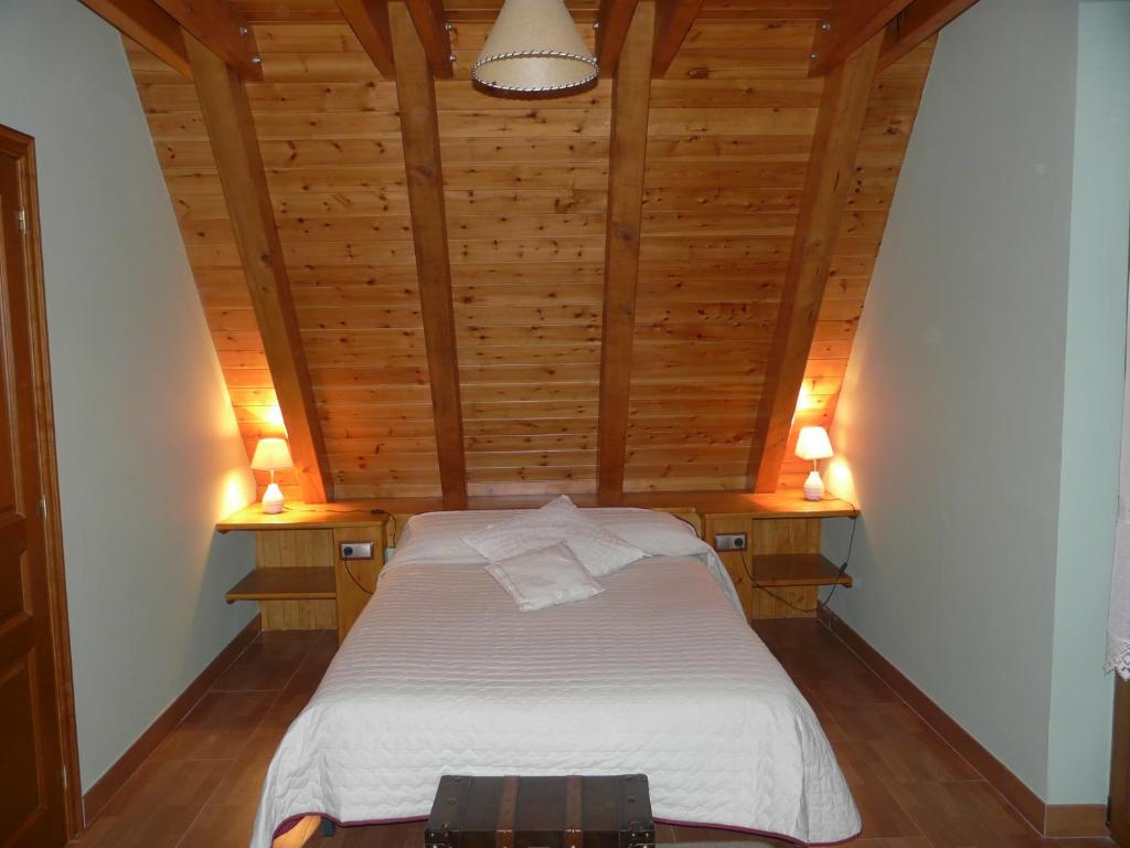 מיטה או מיטות בחדר ב-Cap De La Vila