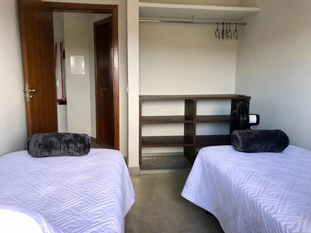 Postel nebo postele na pokoji v ubytování Vila dos Cristais