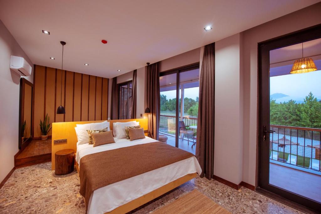 Postel nebo postele na pokoji v ubytování Arwen Hotel
