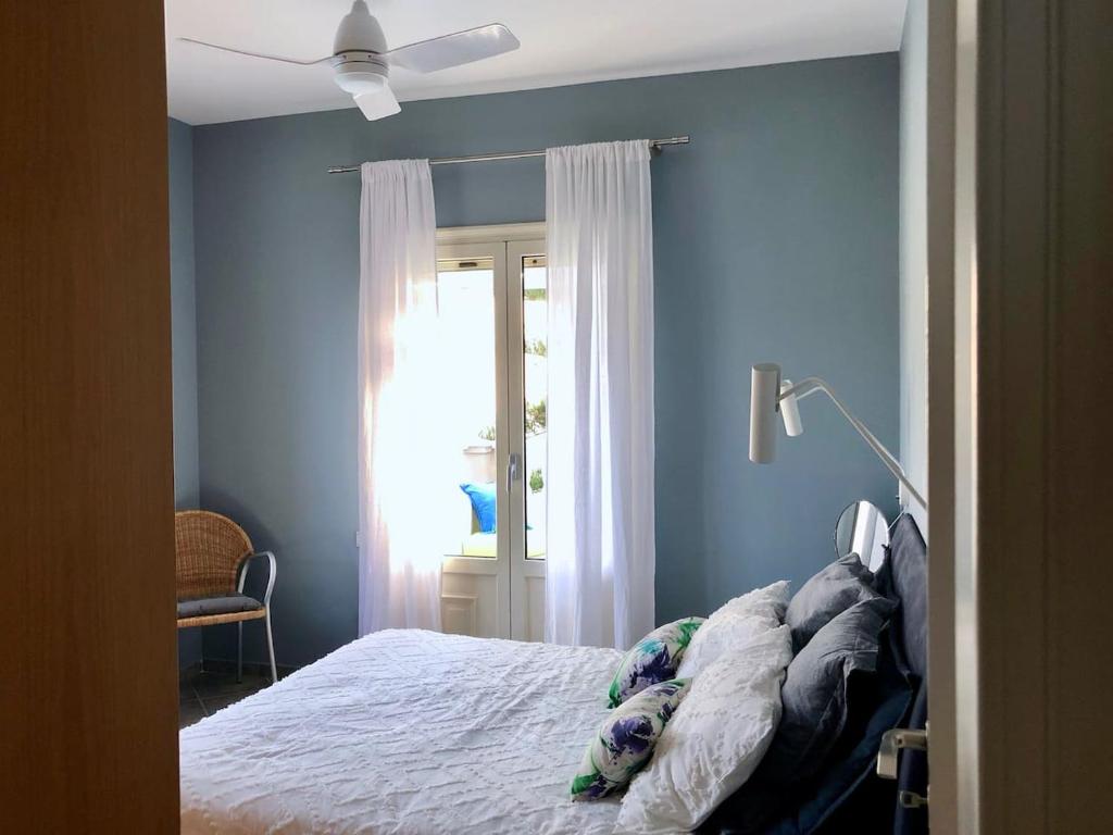 Posteľ alebo postele v izbe v ubytovaní Villa Dolphin Akrata