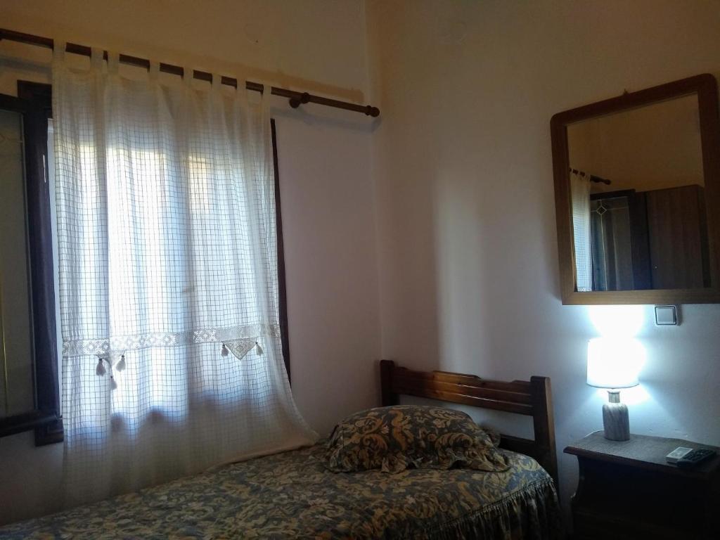 Postel nebo postele na pokoji v ubytování Dameli