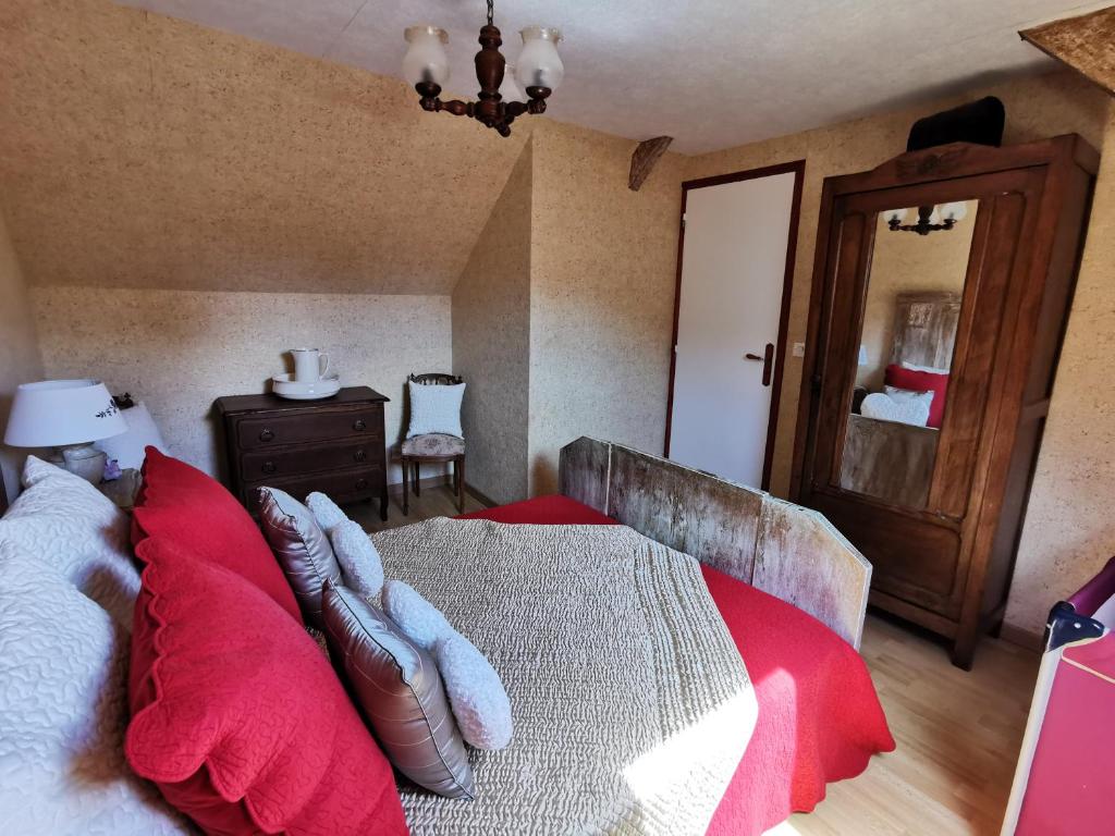 Postel nebo postele na pokoji v ubytování Claquerel
