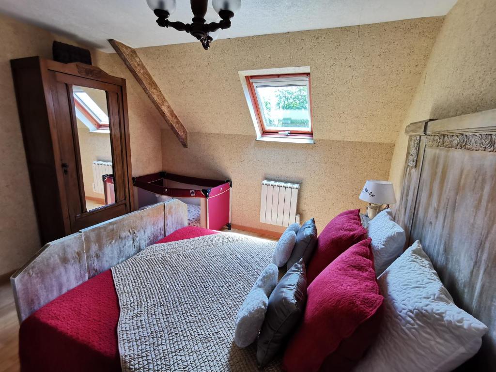 Postel nebo postele na pokoji v ubytování Claquerel