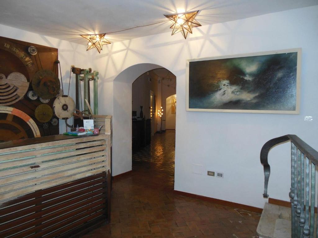 TV a/nebo společenská místnost v ubytování La Locanda Delle Donne Monache