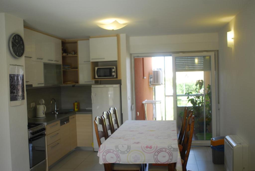 Kuchyň nebo kuchyňský kout v ubytování Apartment Pijaca