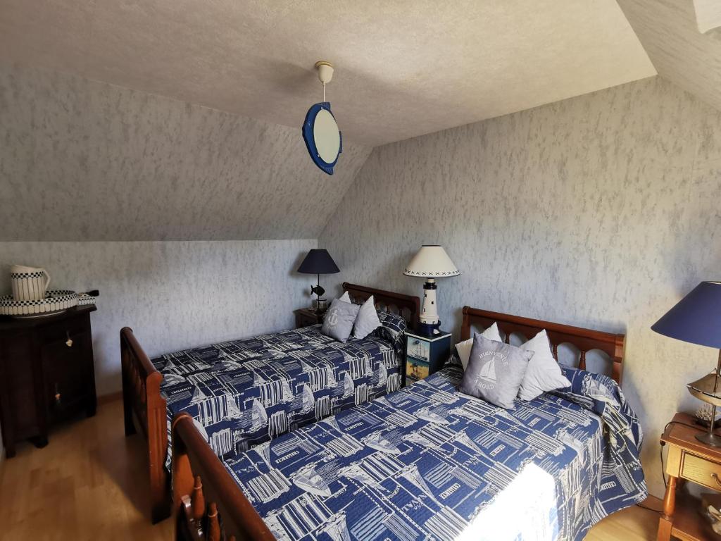 Postel nebo postele na pokoji v ubytování Claquerel