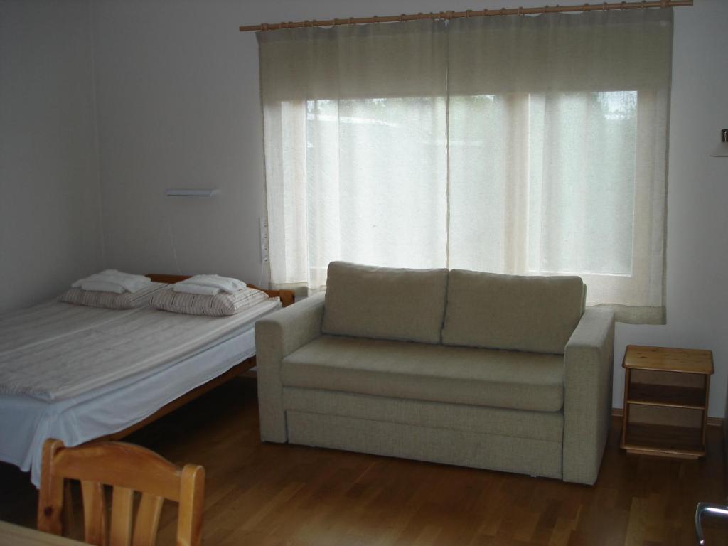 Postel nebo postele na pokoji v ubytování Aisa Accommodation