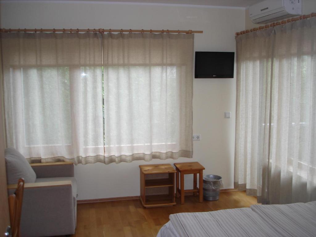 TV a/nebo společenská místnost v ubytování Aisa Accommodation