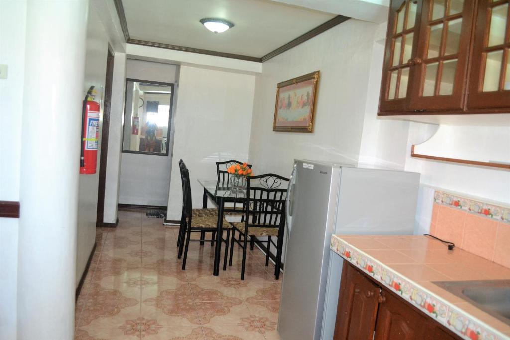 Kuchyň nebo kuchyňský kout v ubytování Villa Prescilla