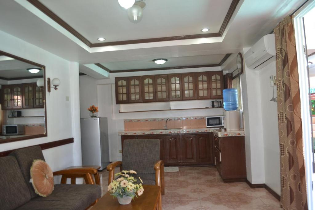 Kuchyň nebo kuchyňský kout v ubytování Villa Prescilla