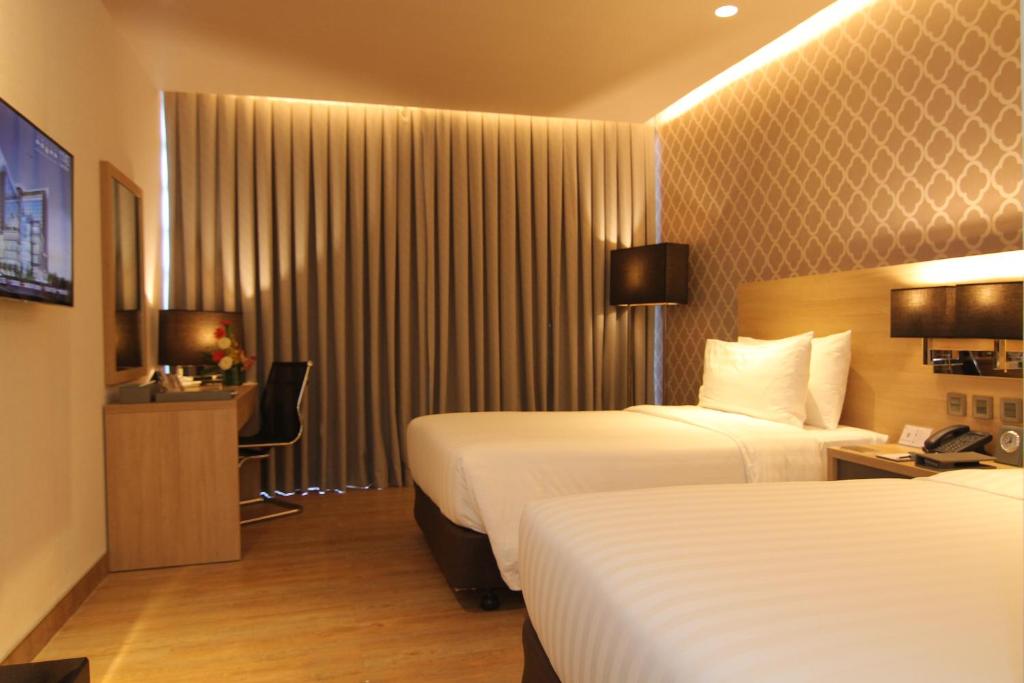 bai Hotel Cebuにあるベッド