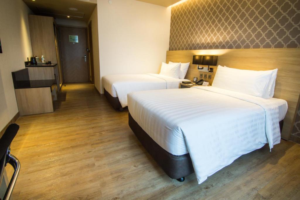 bai Hotel Cebuにあるベッド