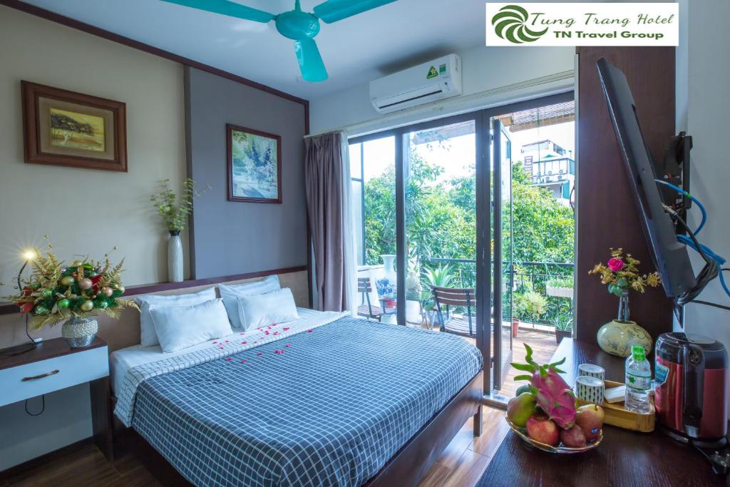 Voodi või voodid majutusasutuse Tung Trang Hotel toas
