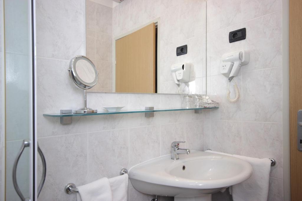 Een badkamer bij Rooms Alla Beccaccia