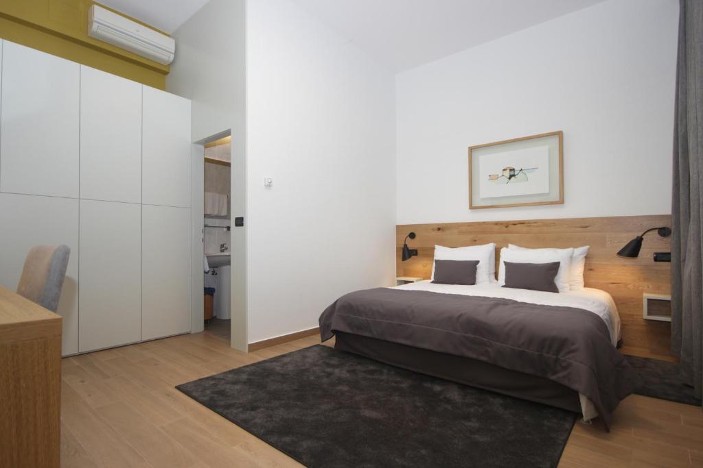 Een bed of bedden in een kamer bij Rooms Alla Beccaccia