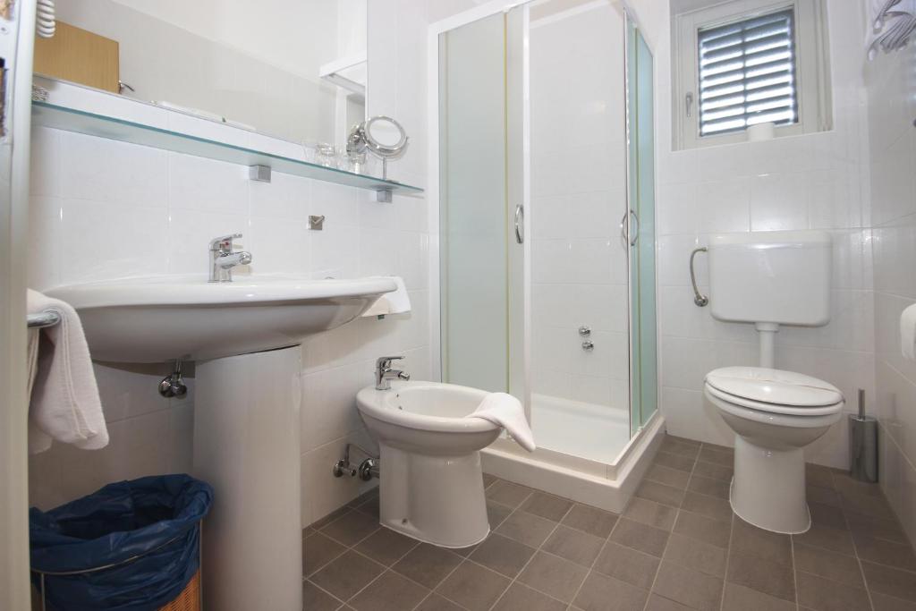 Een badkamer bij Rooms Alla Beccaccia