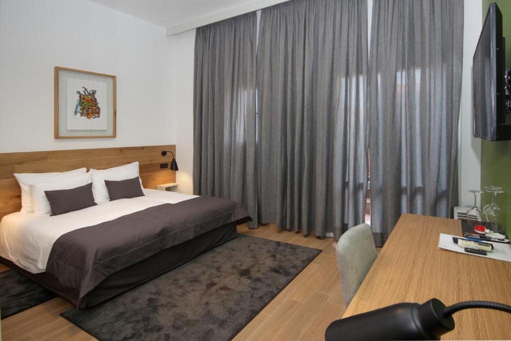 Een bed of bedden in een kamer bij Rooms Alla Beccaccia
