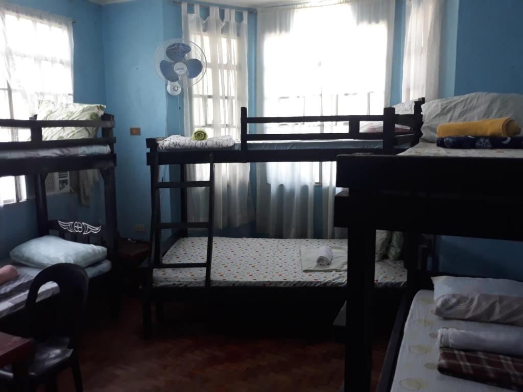 Postel nebo postele na pokoji v ubytování cv bed n bath san juan