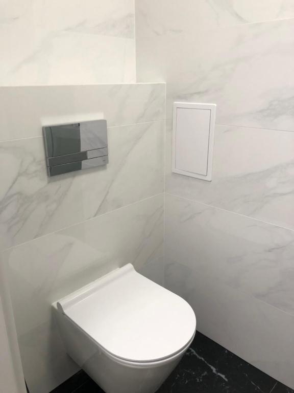Koupelna v ubytování Apartament Komfortowy z klimatyzacja Plazowa 6