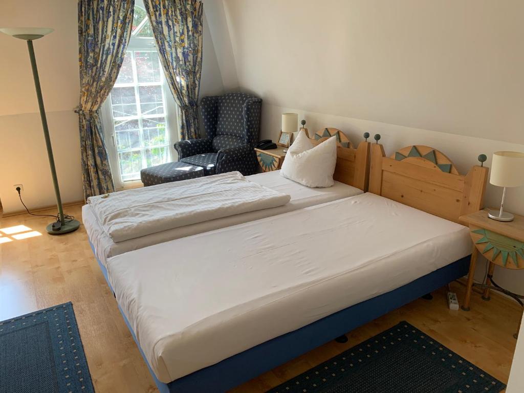 Voodi või voodid majutusasutuse Hotel Zwei Länder toas