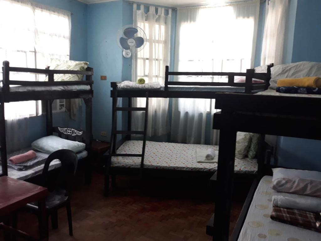 Postel nebo postele na pokoji v ubytování cv bed n bath san juan