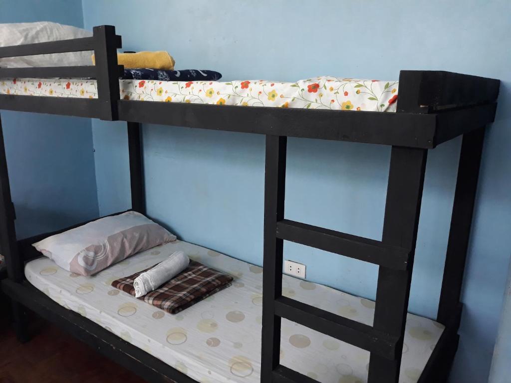 Postel nebo postele na pokoji v ubytování cv bed n bath san juan