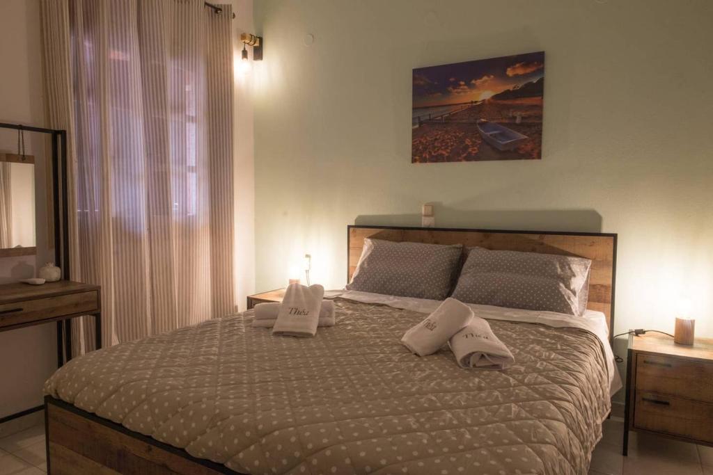 Postel nebo postele na pokoji v ubytování Théa