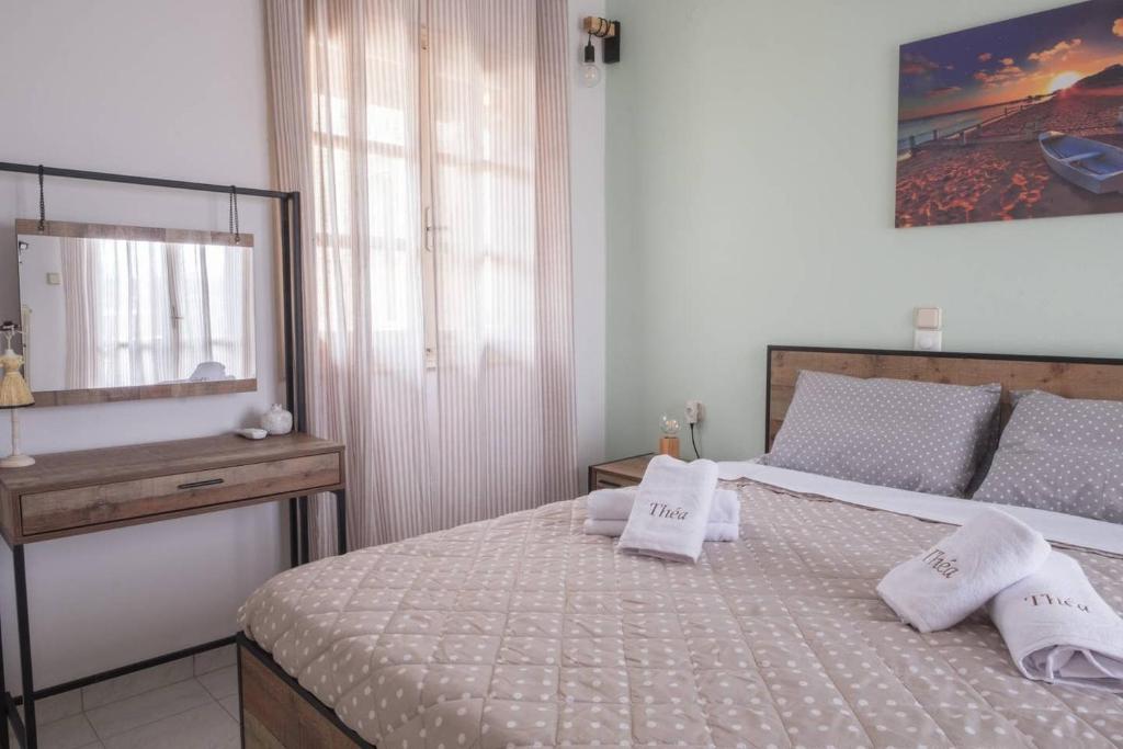Postel nebo postele na pokoji v ubytování Théa