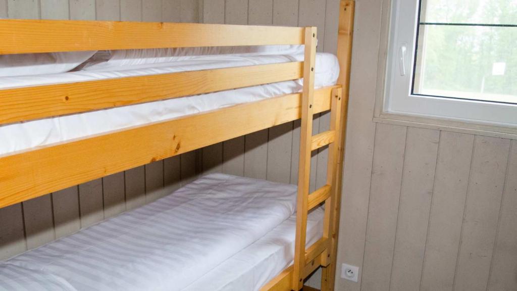 Postel nebo postele na pokoji v ubytování Vallée Les Etoiles